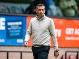 Sacked Dundee United manager Jack Ross walks down the touchline following the 9-0 defeat to Celtic on Sunday. (Photo by Paul Devlin / SNS Group)