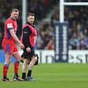 Finn Russell of Bath Rugby leaves the pitch following an injury against Exeter.