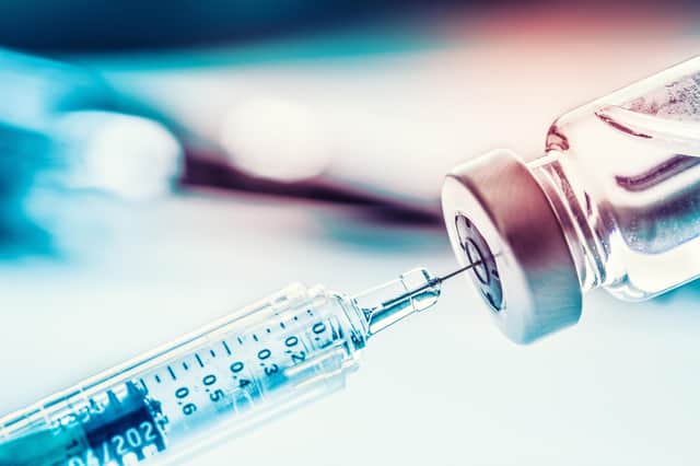 Close-up of a medical syringe with the flu vaccine