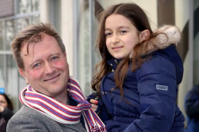 Richard Ratcliffe, with his daughter Gabriella, outside his North London home ahead of his wife Nazanin Zaghari-Ratcliffe's return.