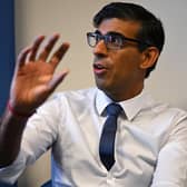 Prime Minister Rishi Sunak speaks during a meeting with a multi-disciplinary team who provide virtual care during a visit to the Rutland Lodge Healthcare Centre in Leeds.