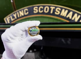 A collectable £2 coin at East Lancashire Railway in Bury ahead of its release by The Royal Mint, in collaboration with the National Railway Museum to celebrate the centenary of the world's most famous locomotive, the Flying Scotsman. Issue date: Tuesday February 21, 2023.