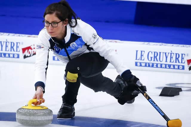 Scotland skip Eve Muirhead makes a shot against Denmark at the Women's World Curling Championship in Calgary. Picture: Jeff McIntosh/The Canadian Press via AP