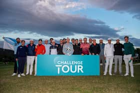 Scottish duo Ewen Ferguson, thid left, and Craig Howie, seventh left, celebrate with their fellow Challenge Tour graduates at the end of the Rolex Challenge Tour Grand Final supported by the R&A at T-Golf & Country Club in Mallorca. Picture: Octavio Passos/Getty Images.