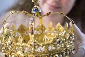 Reed Hudson, Historic Environment Scotland metal conservator, inspecting the Crown of Scotland. Picture: HES