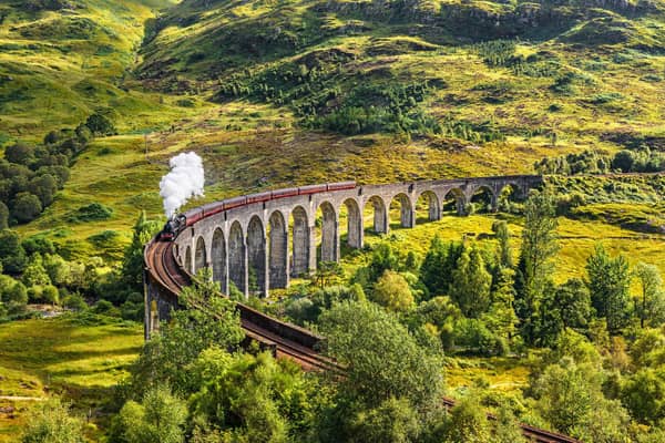 Glenfinnan Railway Viaduct with the Jacobite steam train passing over
