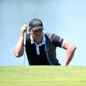 Marc Warren lines up a putt on the 10th green on his way to a second-round 69 in the Austrian Open at Diamond Country Club, near Vienna. Picture: Stuart Franklin/Getty Images