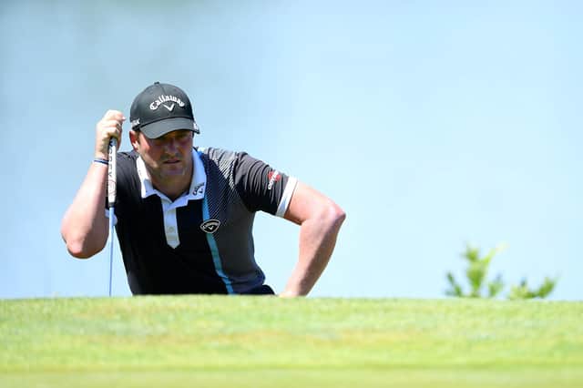 Marc Warren lines up a putt on the 10th green on his way to a second-round 69 in the Austrian Open at Diamond Country Club, near Vienna. Picture: Stuart Franklin/Getty Images