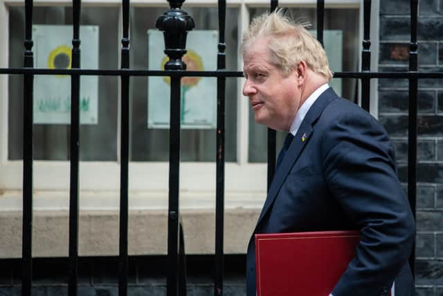 Prime Minister, Boris Johnson, leaves 10 Downing Street to attend Prime Ministers Questions at the House of Parliament on April 20. (Photo by Chris J Ratcliffe/Getty Images)
