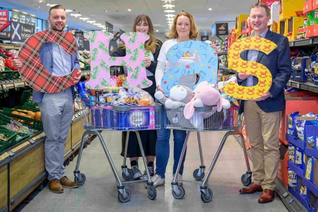 Craig Hutton (Aldi), Linsey Cairns and Georgina Bushell (CHAS), Graham Nicolson (Aldi)