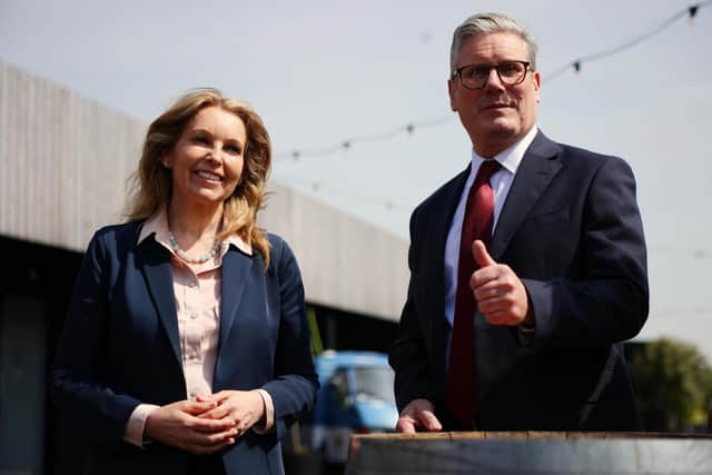 Keir Starmer gives a thumbs up as he announces his plan to stop illegal small boat crossings on Friday, alongside new Labour MP Natalie Elphicke (Picture: Dan Kitwood/Getty Images)