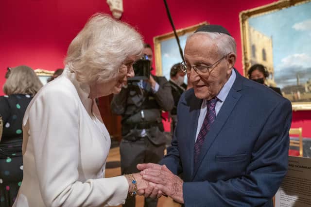 Camilla, Duchess of Cornwall with Holocaust survivor Manfred Goldberg at an exhibition of Seven Portraits: Surviving the Holocaust, which were commissioned by Prince Charles, Prince of Wales. Picture: Arthur Edwards - WPA Pool/Getty Images