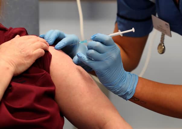 A patient receiving their vaccine at the Western General Hospital, in Edinburgh picture: PA/Andrew Milligan