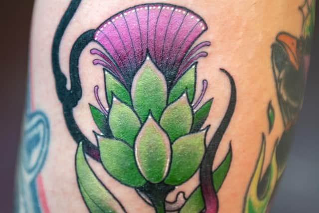 Thistle design tattoo at Scottish Tattoo Convention Pic: Bart Masiukiewicz aka Pictures in Blood.