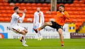 Dundee United striker Tony Watt's challenge on Motherwell's Sean Goss that earned a red card following a VAR check. (Photo by Simon Wootton / SNS Group)