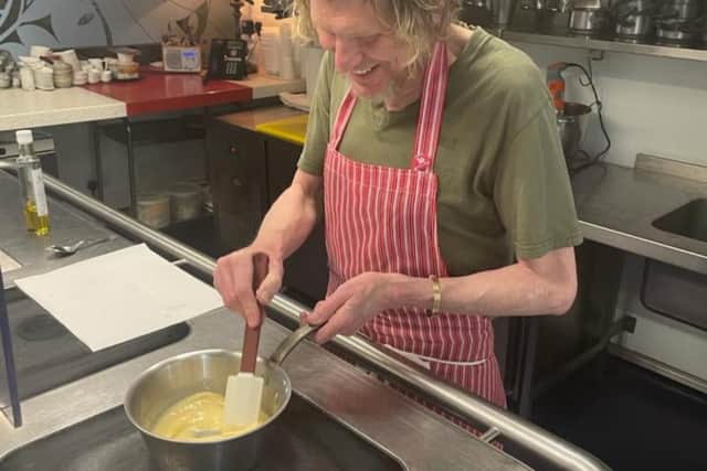Paul Kitching making scrambled eggs