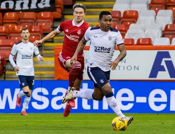 Aberdeen's Ryan Hedges (left) catches Rangers striker Alfredo Morelos and is sent off (Photo by Craig Williamson / SNS Group)