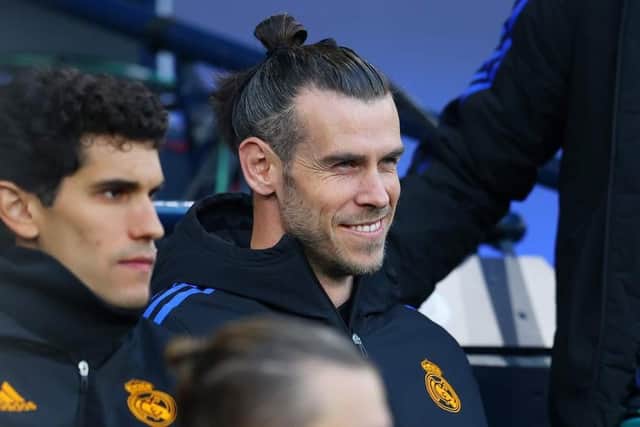 Gareth Bale could be facing Scotland in a World Cup play-off after being made an MBE