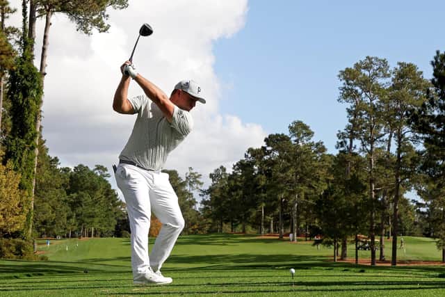 Bryson DeChambeau plays his shot from the 17th tee during a practice round prior to the Masters at Augusta National Golf Club. Picture: Jamie Squire/Getty Images