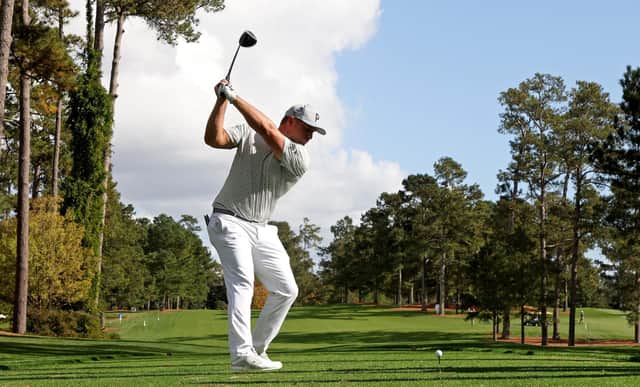 Bryson DeChambeau plays his shot from the 17th tee during a practice round prior to the Masters at Augusta National Golf Club. Picture: Jamie Squire/Getty Images