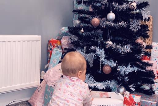 Abby Porter shared this photo of her baby looking at the Christmas tree.