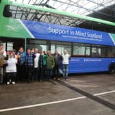 Support in Mind Scotland staff and people they support with the Lothian bus with Support in Mind Scotland livery