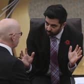 Deputy First Minister John Swinney consults health secretary, Humza Yousaf during First Minster's Questions at the Scottish Parliament in Holyrood. Picture: PA