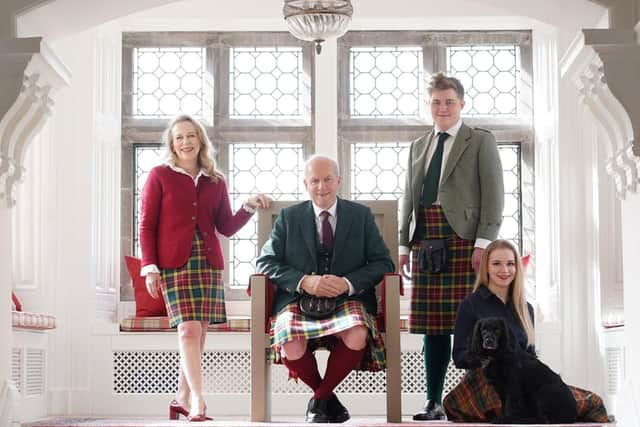 John Michael Baillie-Hamilton Buchanan, pictured with his wife, Lady Buchanan, his daughter Lucy and son Rory.  PIC: Stewart Attwood Photography.