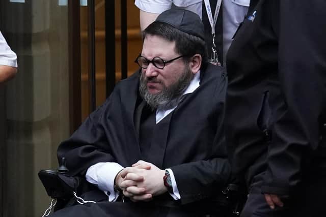 Nicholas Rossi leaving Edinburgh Sheriff and Justice of the Peace Court after an extradition hearing. (Photo credit: Andrew Milligan/PA Wire)