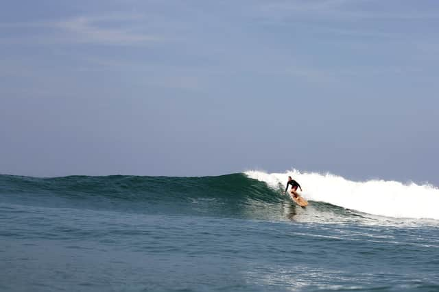 An Otter surfboard in action