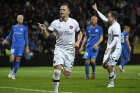Hearts striker Lawrence Shankland celebrates scoring his penalty against RFS Pic: AP/Roman Koksarov