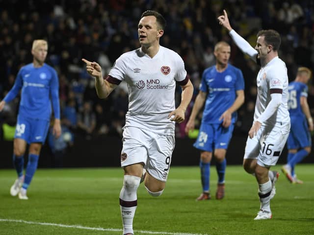 Hearts striker Lawrence Shankland celebrates scoring his penalty against RFS Pic: AP/Roman Koksarov
