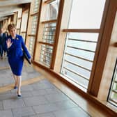 Outgoing First Minister Nicola Sturgeon arrive for her last First Minster's Questions (FMQs) in the debating chamber of the Scottish Parliament in Edinburgh