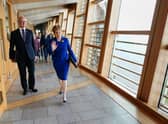 Outgoing First Minister Nicola Sturgeon arrive for her last First Minster's Questions (FMQs) in the debating chamber of the Scottish Parliament in Edinburgh