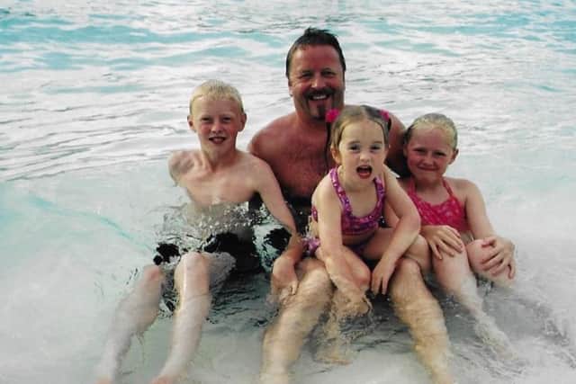 Ian with his children in Florida in 2002