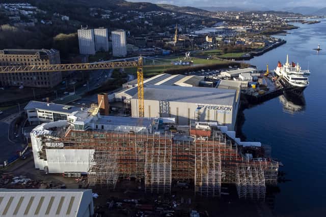 Glen Rosa clad in scaffolding with Glen Sannox moored behind, at the Ferguson Marine shipyard in Port Glasgow on Friday January 5. (Photo by Jane Barlow/PA Wire)