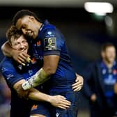 Hamish Watson and Viliame Mata of Edinburgh Rugby celebrate following the team's victory over Bayonne.