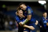 Hamish Watson and Viliame Mata of Edinburgh Rugby celebrate following the team's victory over Bayonne.