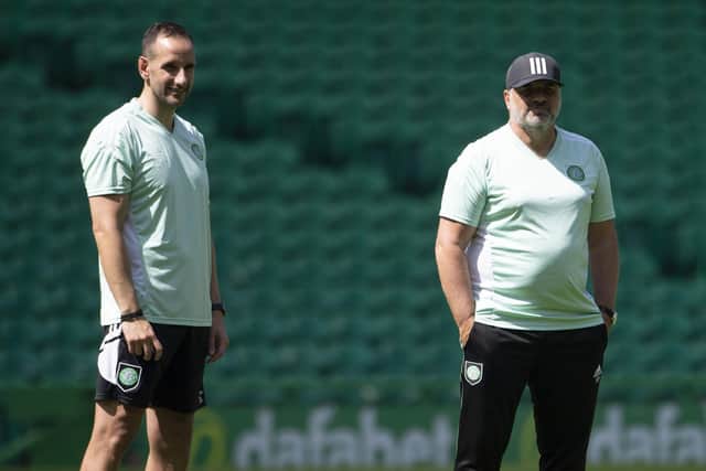 John Kennedy (L) and Ange Postecoglou during a Celtic training session.