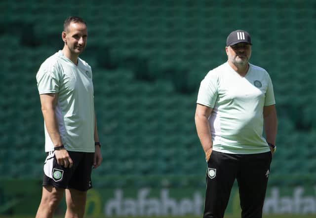 John Kennedy (L) and Ange Postecoglou during a Celtic training session.