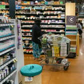 Shoppers are seen at a branch of Whole Foods Market , which has closed a branch in San Francisco amid crime fears.