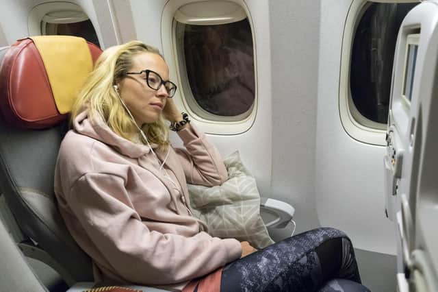 Comfortable clothing is key to relaxing on a plane. Pic: Alamy/PA.