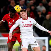 Liverpool's Ibrahima Konate and Manchester United's Scott McTominay battle for the ball.