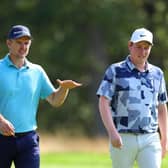 Bob MacIntyre, right, chats with Justin Roseduring the second round of the BMW PGA Championship at Wentworth Club in Virginia Water. Picture: Andrew Redington/Getty Images.