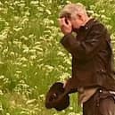 Harrison Ford, as Indiana Jones, looks as though he's fighting Borders midges in his new film, shooting at Leaderfoot Viaduct last night. Picture: Neil Renton.