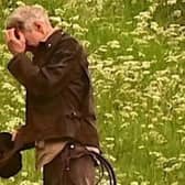 Harrison Ford, as Indiana Jones, looks as though he's fighting Borders midges in his new film, shooting at Leaderfoot Viaduct last night. Picture: Neil Renton.