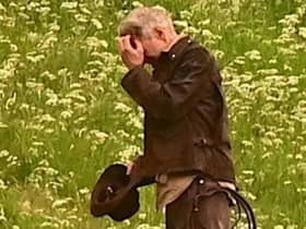 Harrison Ford, as Indiana Jones, looks as though he's fighting Borders midges in his new film, shooting at Leaderfoot Viaduct last night. Picture: Neil Renton.