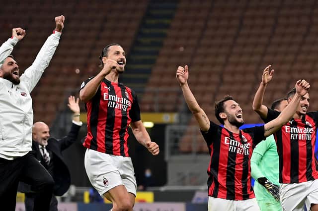 AC Milan have had plenty to celebrate so far this season  (Photo by MIGUEL MEDINA/AFP via Getty Images)