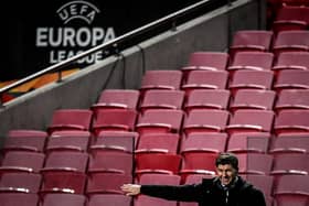 Steven Gerrard left frustrated in Lisbon on Thursday as Rangers let a 3-1 lead slip to draw 3-3 with 10-man Benfica in Group D of the Europa League. (Photo by PATRICIA DE MELO MOREIRA/AFP via Getty Images)