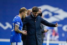 Rangers manager Steven Gerrard (centre) talks to Scott Arfield and Cedric Itten as they prepare to come on as a substitute during a Scottish Premiership match between Rangers and Livingston at Ibrox Stadium, on October 25, 2020, in Glasgow, Scotland. (Photo by Rob Casey / SNS Group)